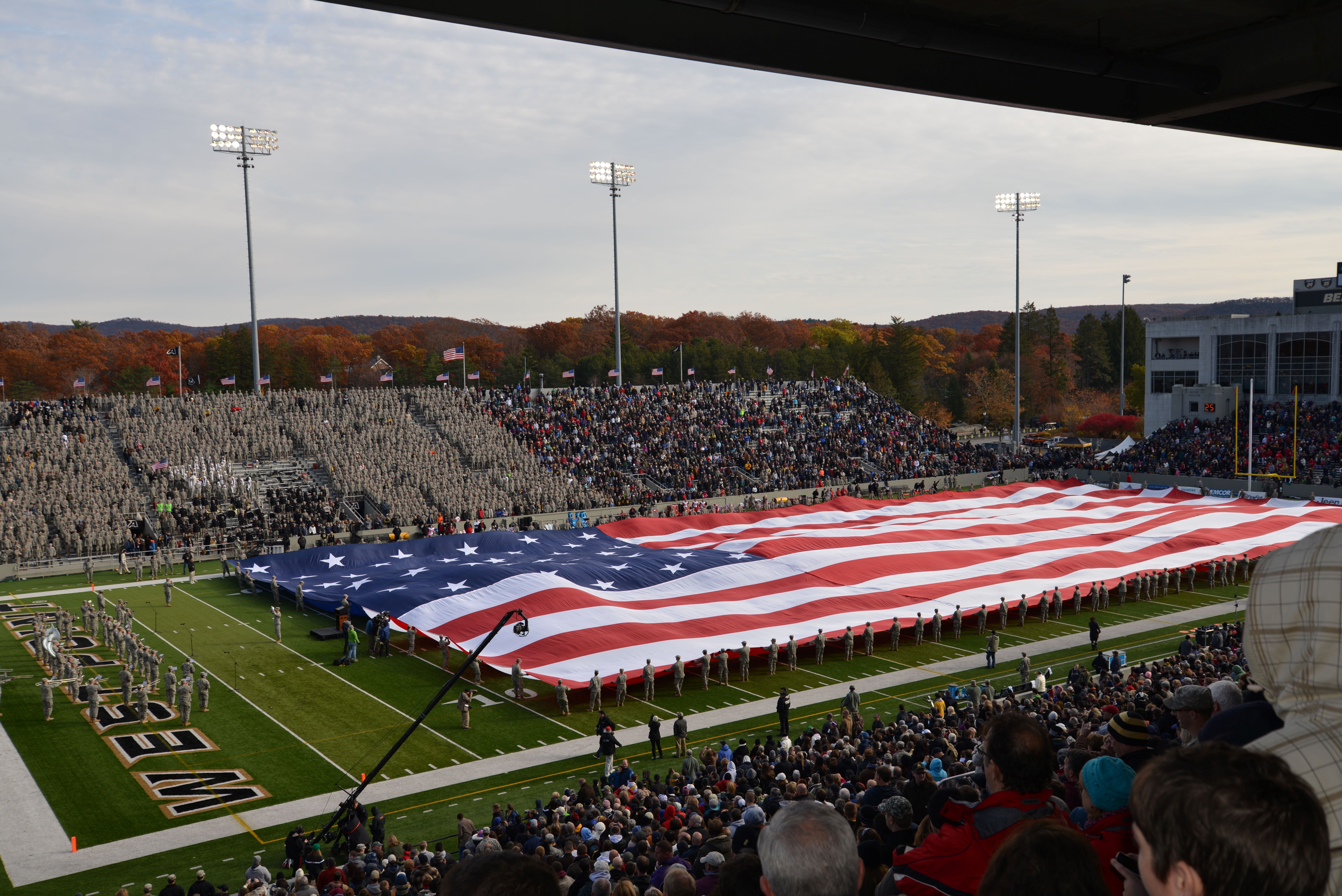 American Flag Covering Football Field